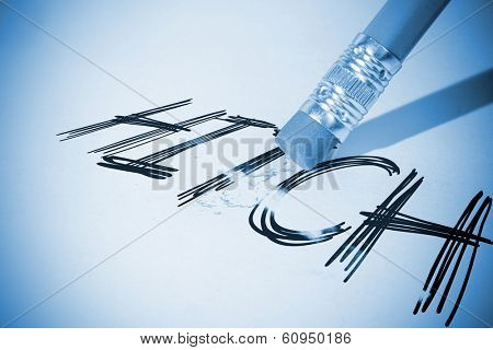 Pencil erasing the word hitch on paper