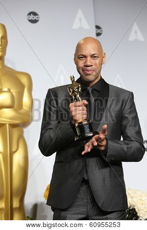 LOS ANGELES - MAR 2:: John Ridley  in the press room at the 86th Annual Academy Awards on March 2, 2014 in Los Angeles, California