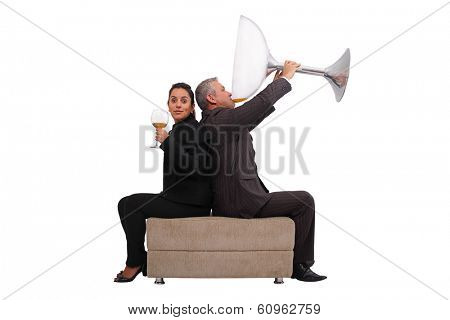 A brazilian couple just enjoying a little sip - Isolated on white background.