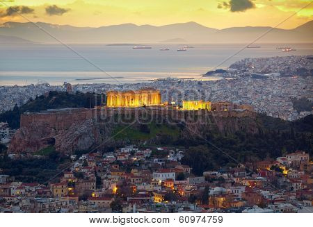 Athens, Greece. After sunset.  Parthenon and Herodium construction in Acropolis Hill