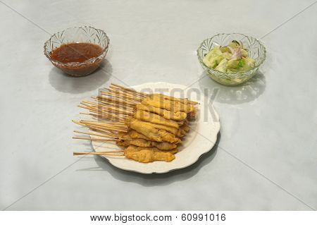 Grilled Pork Satay With Peanut Sauce And Vinegar.