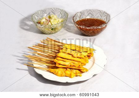 Grilled Pork Satay With Peanut Sauce And Vinegar.
