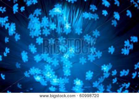snowflakes shaped bokeh pattern - abstract winter background