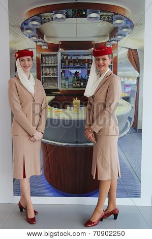 Emirates Airlines flight attendants at the Emirates Airlines booth at the US Open 2014