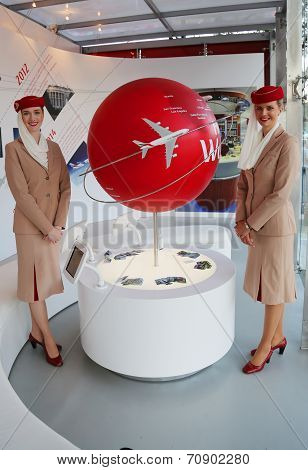 Emirates Airlines flight attendants at the Emirates Airlines booth at the US Open 2014