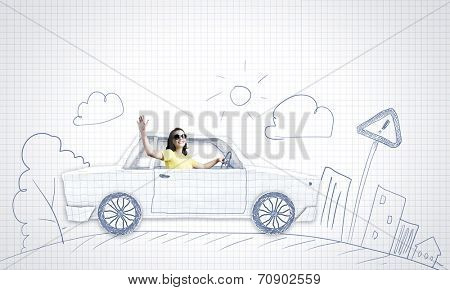 Young woman riding car made of list of paper