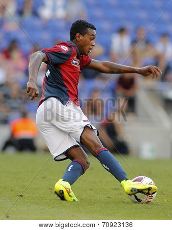 BARCELONA - AUG, 17: Edenilson of Genoa CFC in action during a friendly match against RCD Espanyol at the Estadi Cornella on August 17, 2014 in Barcelona, Spain