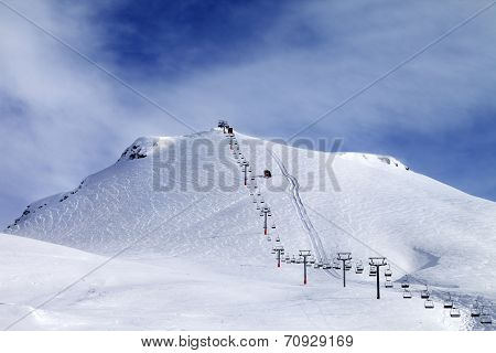 Ski Slope And Chair-lift At Morning