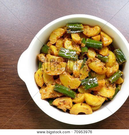 Indian style instant and healthy amla and chili pickle