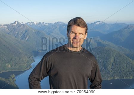 Hiker On Top Of Mountain