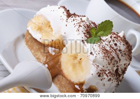 Slice Banoffee Pie With Cream And Coffee Macro Horizontal