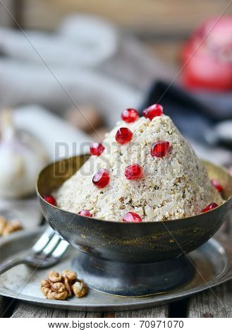 traditional Georgian vegetable snack of a pkhali in a vintage metal bowl
