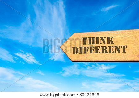 Blank Wooden Arrow Over Clear Blue Sky With Copy Space