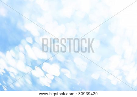 Light blue and white heart bokeh