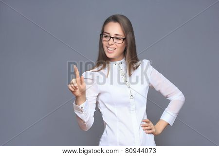woman pointing her finger on imaginery button