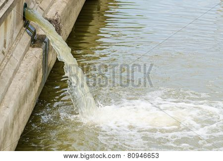 Flow Out Water From The Conduit To The River