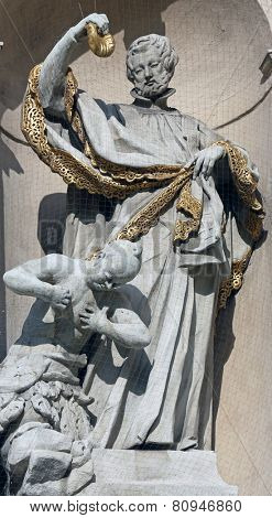 VIENNA, AUSTRIA - OCTOBER 10: Statue of Saint on baroque Jesuits church. The church was built between 1623 and 1627. in Vienna, Austria on October 10, 2014.