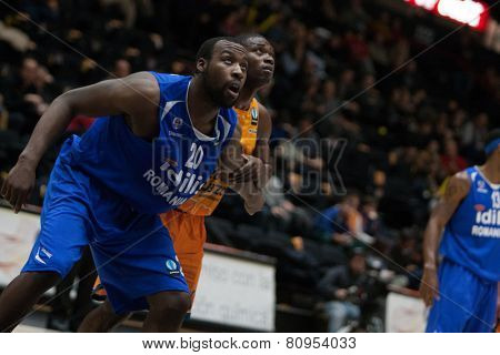 VALENCIA, SPAIN - JANUARY 21: Cooper 20 and Sato during Eurocup match between Valencia Basket Club and CSU Asesoft at Fonteta Stadium on January 21, 2015 in Valencia, Spain