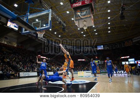 VALENCIA, SPAIN - JANUARY 21: Players in action during Eurocup match between Valencia Basket Club and CSU Asesoft at Fonteta Stadium on January 21, 2015 in Valencia, Spain