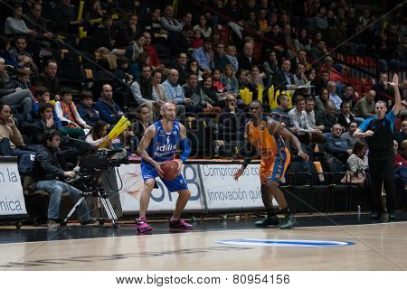 VALENCIA, SPAIN - JANUARY 21: Szijarto (L) and Sato during Eurocup match between Valencia Basket Club and CSU Asesoft at Fonteta Stadium on January 21, 2015 in Valencia, Spain