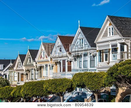Victorian Houses in San Francisco on blue sky background