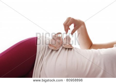 a pregnant woman on a white background