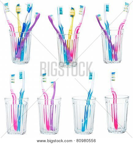 Collection Of Tooth Brushes In Clear Glases