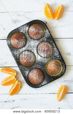 Orange Muffins In Baking Dish