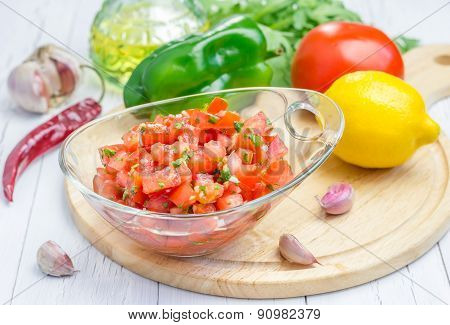 Bowl Of Fresh Homemade Salsa Dip And Ingredients