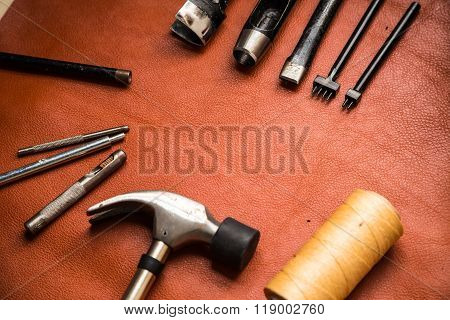 Leather Crafting Tools On Work Table.