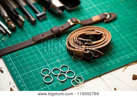 Leather Crafting Tools On Work Table.