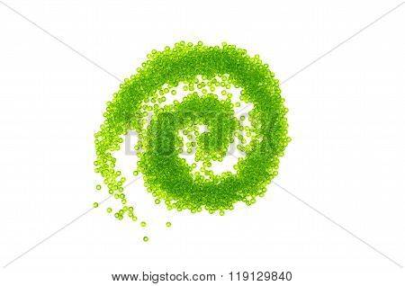Bright glass beads curl on white background