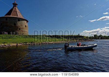 ORESHEK FORTRESS, LENINGRAD OBLAST, RUSSIA - AUGUST 15, 2015: Boat participating in River marathon Oreshek Fortress race. This international motorboat competitions is held since 2003