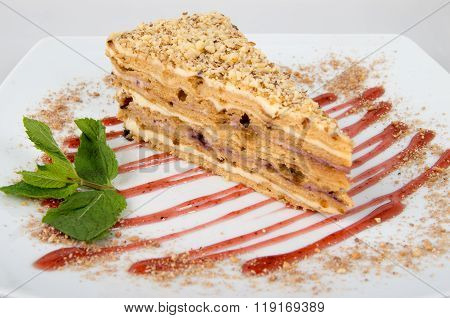 Cake with cream and strawberries.