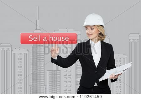 Businesswoman pressing sell a hause button on virtual screens