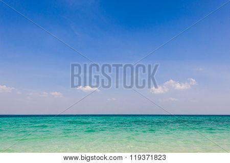 Clear Blue Skies And Emerald Sea