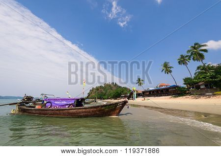 Boats Anchored On Beach