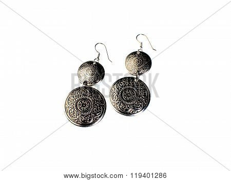 Earrings With Embossed On Metal Isolated On White