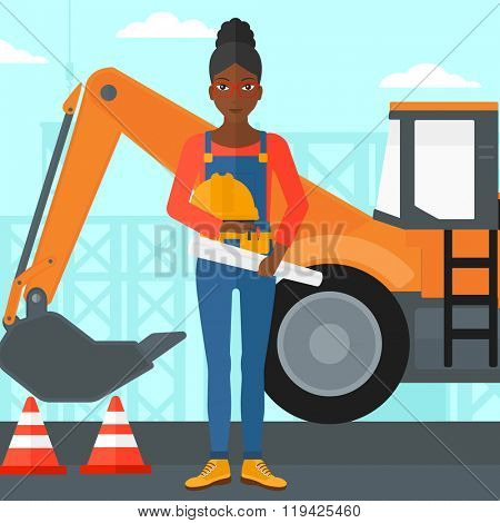 Engineer with hard hat and blueprint.