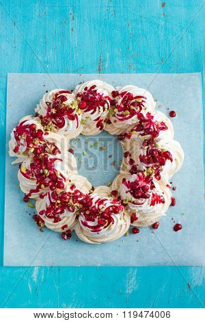 Meringues Pavlova Cake Wreath With Pomegranate, Cranberry And Pistachios