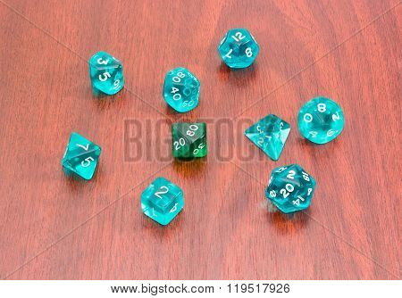 Specialized Polyhedral Dice For Role-playing Games On Wooden Surface