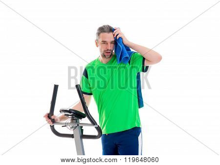 Young Man Train With Fitness Machine