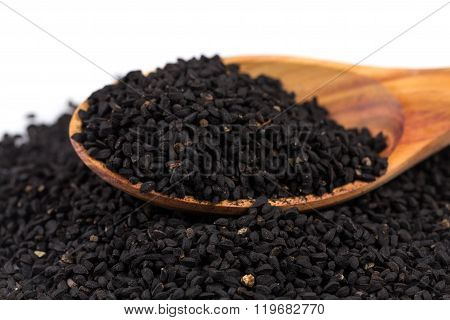Heap Of Black Sesame On Wooden Spoon