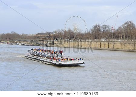 Paris, France, February 9, 2016: the boat on a river Sena in Paris, France