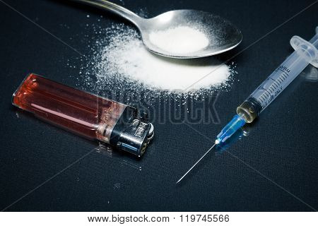 syringe , heroin, cocaine, spoon