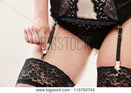 Woman Wear Garter Belt And Stockings.