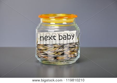 Saving Concept Of Coins In The Glass Jar For Nexy Baby  Purpose