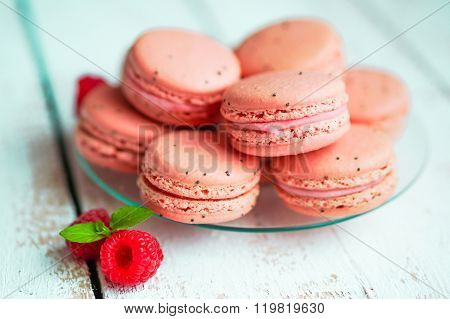 Raspberry Macaroons With Berries On Wooden Table