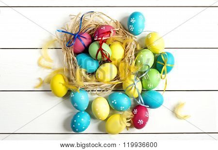 Colored Easter Eggs On A White Table