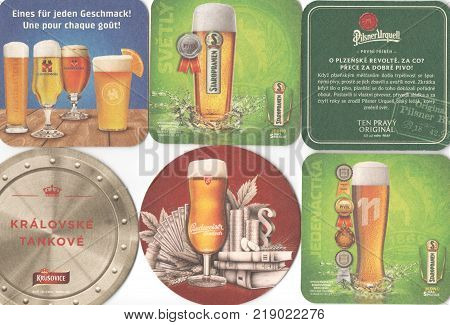 PRAGUE CZECH REPUBLIC - DECEMBER 20 2017: Beermats (bierdeckel) background. Various beer trademarks